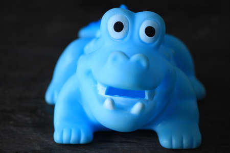blue crocodile doll to play kids games.の写真素材