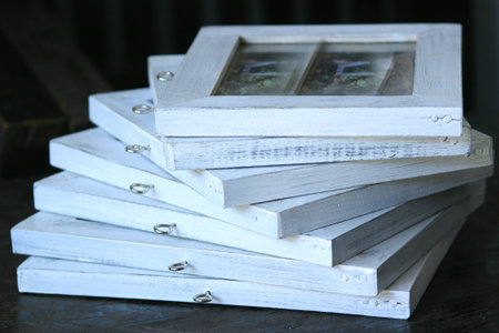 hand crafted photo frame with artistic dull white paint forming a beautiful pattern.