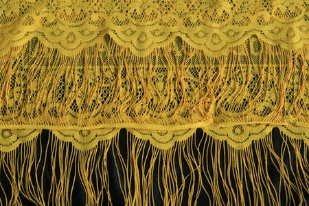the patterns and motifs of the traditional yellow fabrics are beautiful and artisticの写真素材