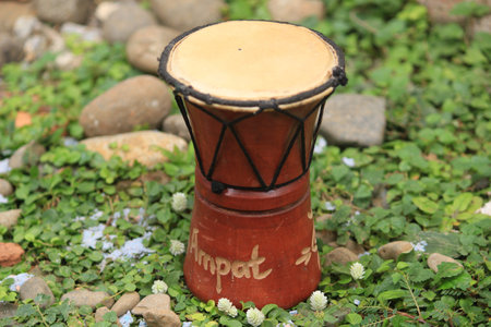 unique souvenirs of traditional percussion instruments called Kendang typical of Papua Indonesia,...