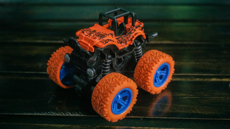 monster car toy with distinctive big wheels. This car can drive on broken terrain roads