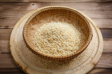 Sesame seed in a basket on the wood plate