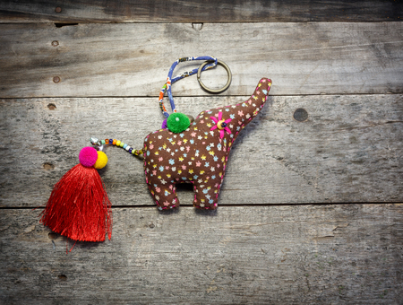 The elephant Craft of rag on the wood backgroundの写真素材