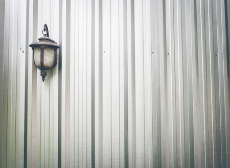 Wall corrugated steel and lamp background