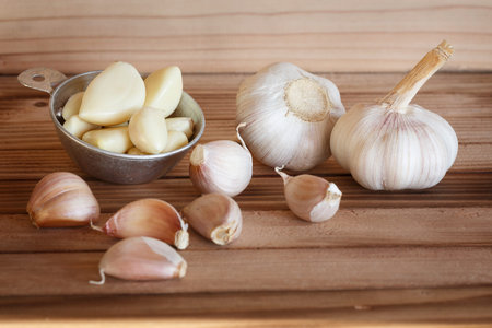 Dried Garlic on wood background