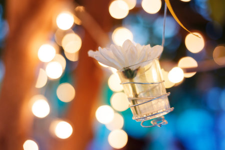 Beautiful flowers in the glass bucket. Decorated in celebration night party. with blur background...