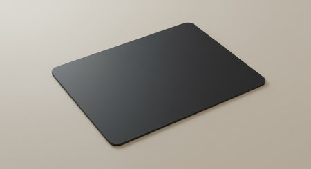 Sleek black plastic card mockup resting on a smooth, neutral beige surface, perfect for showcasing credit card designs or creating elegant business card templates. The minimalist design and soft lighting highlight the card's details, making it ideal for modern branding and promotional materials.の素材