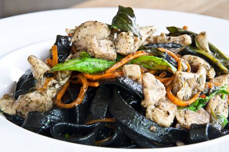 Stir in spaghetti, black lines  A spicy  thai style の写真素材