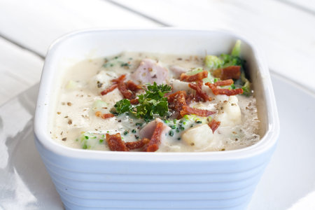 Broccoli, Potato and Bacon baked cheese sprinkle with parsley 