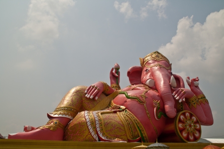 Son of Siva color pink, buddha posture happy.の写真素材