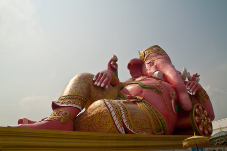 Son of Siva color pink, buddha posture happy.の写真素材