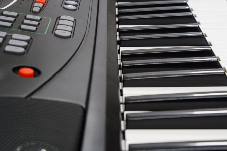 Electric keyboard colur black focus on the keypad の写真素材