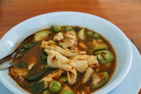 Curry Spicy thai style with silver sillago fish, eggplant.の写真素材