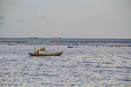 Small boat at the sea.の写真素材