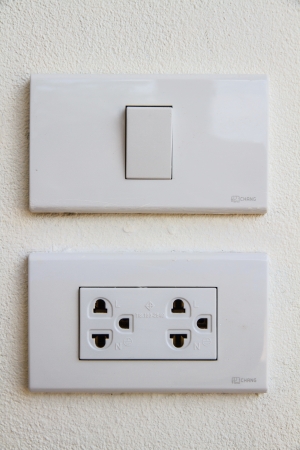 Switches and power outlets in the house の写真素材