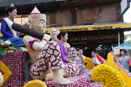 CHIANGMAI, THAILAND - FEBRUARY 8 : People march in celebration in Gate Tapae in Chiang Mai Flower Festival on February 8, 2014 in Chiang Mai, Thailand.のeditorial素材