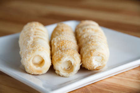 Pie crispy cream on white dish in restaurant.の写真素材