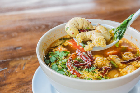 Thai food : Spicy fish eggs soup with chili and mushroom.の写真素材