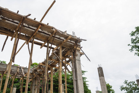 Building construct area cement pillar and wood in construct site