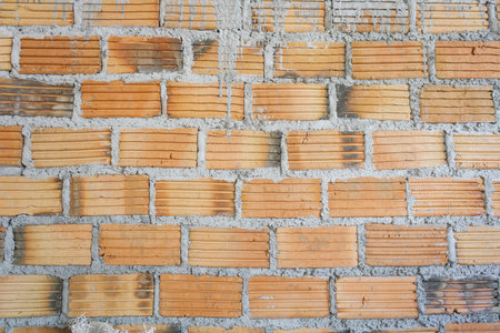 Brick texture and surface brown and red.