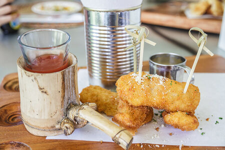 Fish and chips on plate in restaurantの写真素材