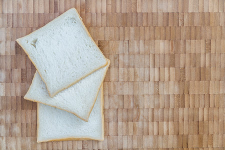 Sandwich bread on a wooden table, Top view.