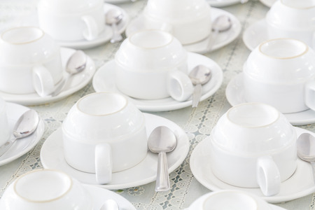 White cup and saucer made ceramic many lots.の写真素材