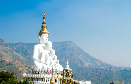 Five white buddha statue located outdoors and blue sky. Wat pha sorn kaew, Khao Kho, Phetchabun, Thailand.の写真素材