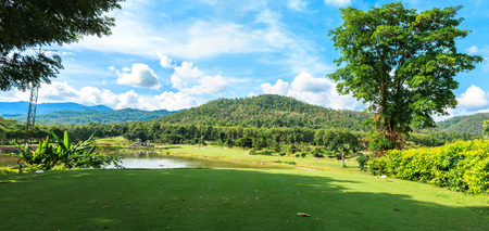 Beautiful green golf course landscape panorama, Golfing resort at Lamphun Province, Thailand.の写真素材