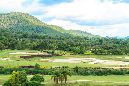 Beautiful green golf course landscape, Golfing resort at Lamphun Province, Thailand.の写真素材