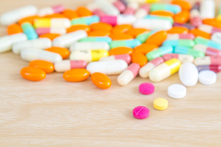 Medicine is pill and capsule with copy space on wood table.の写真素材