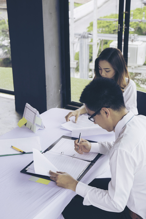 Businessman and Businesswoman work business planning, Teamwork for Success organization. Selective focus.の写真素材