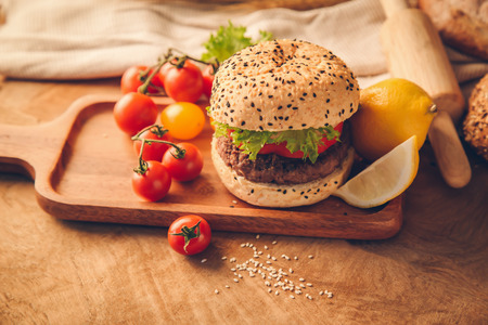 Hamburger homemade on wood table with copy space.の写真素材