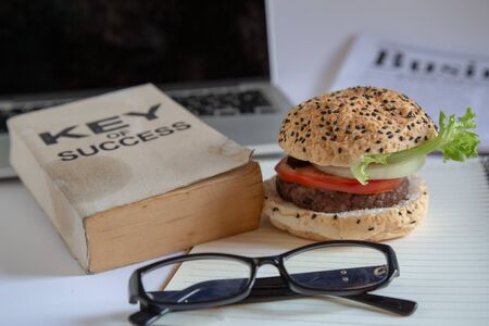 Hamburger food that suits the business rush and busy.の写真素材