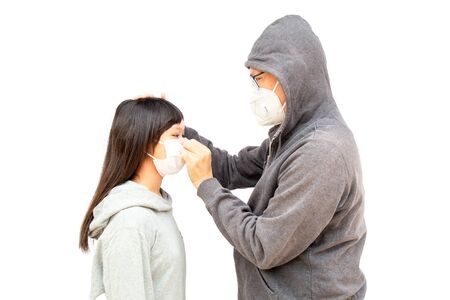 Asian dad and daughter Asia ethnic wearing health mask to prevent virus or flu or covid19 or coronavirus and white background with copy space. Clipping path in the picture.の写真素材