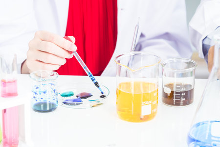 Female Scientists or doctor are trying to find a vaccine against germs Such as the corona virus or COVID 19 in a laboratory.の写真素材