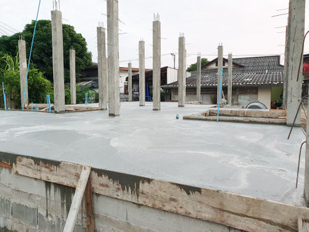 House structure construction Pour the cement floor and pour the cement pillars already. Background its sky.の写真素材