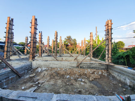 House structure construction Pour the cement floor and pour the cement pillars already. Background its sky.の写真素材