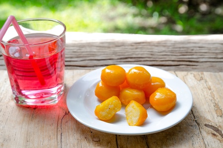 Concept thai sweetmeat red water and flowerの写真素材