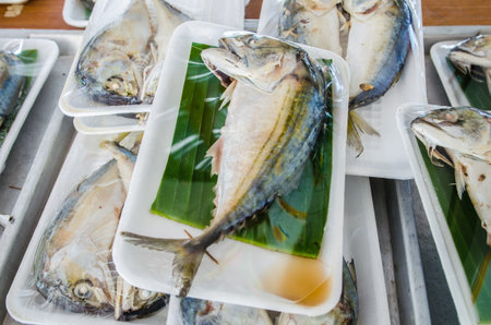 center focus mackerel fish with banana leaves and foam packs. This shot from marketの写真素材