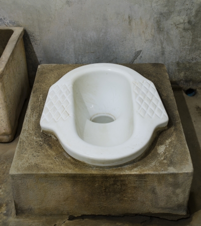 The old squatting latrines in thailandの写真素材