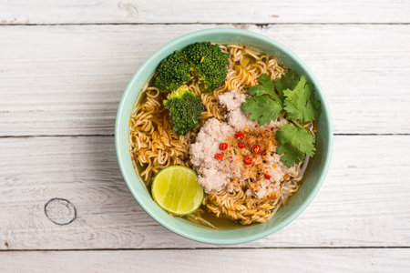 spicy noodle and minced pork with lemon