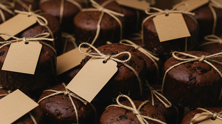 Chocolate muffins with blank labels tied with twine and stringの素材