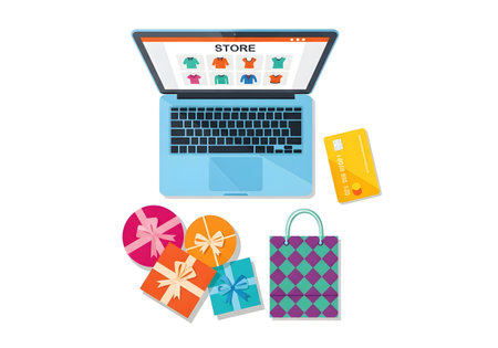 Shopping online concept. Laptop, credit card, gift boxes, shopping bags.の素材