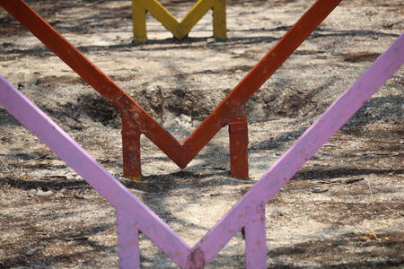 colorful iron structure forming the letter mの写真素材