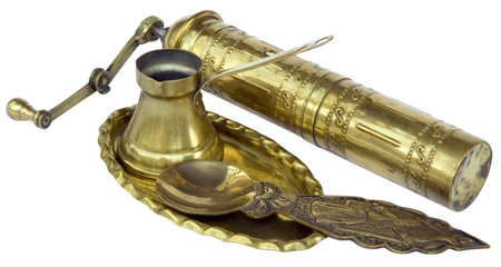 Oriental brass appliance for making and serving coffee isolatedの写真素材