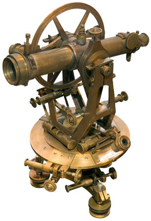 Old brass theodolite isolated の写真素材