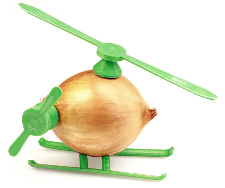Conceptual Helicopter Toy Made with Onion and Plasticの写真素材