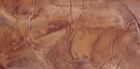 Fictional Mars Soil Aerial View. Trace of Water on Mars Channelsの写真素材