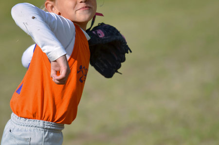 Young Girl Pitchingの写真素材